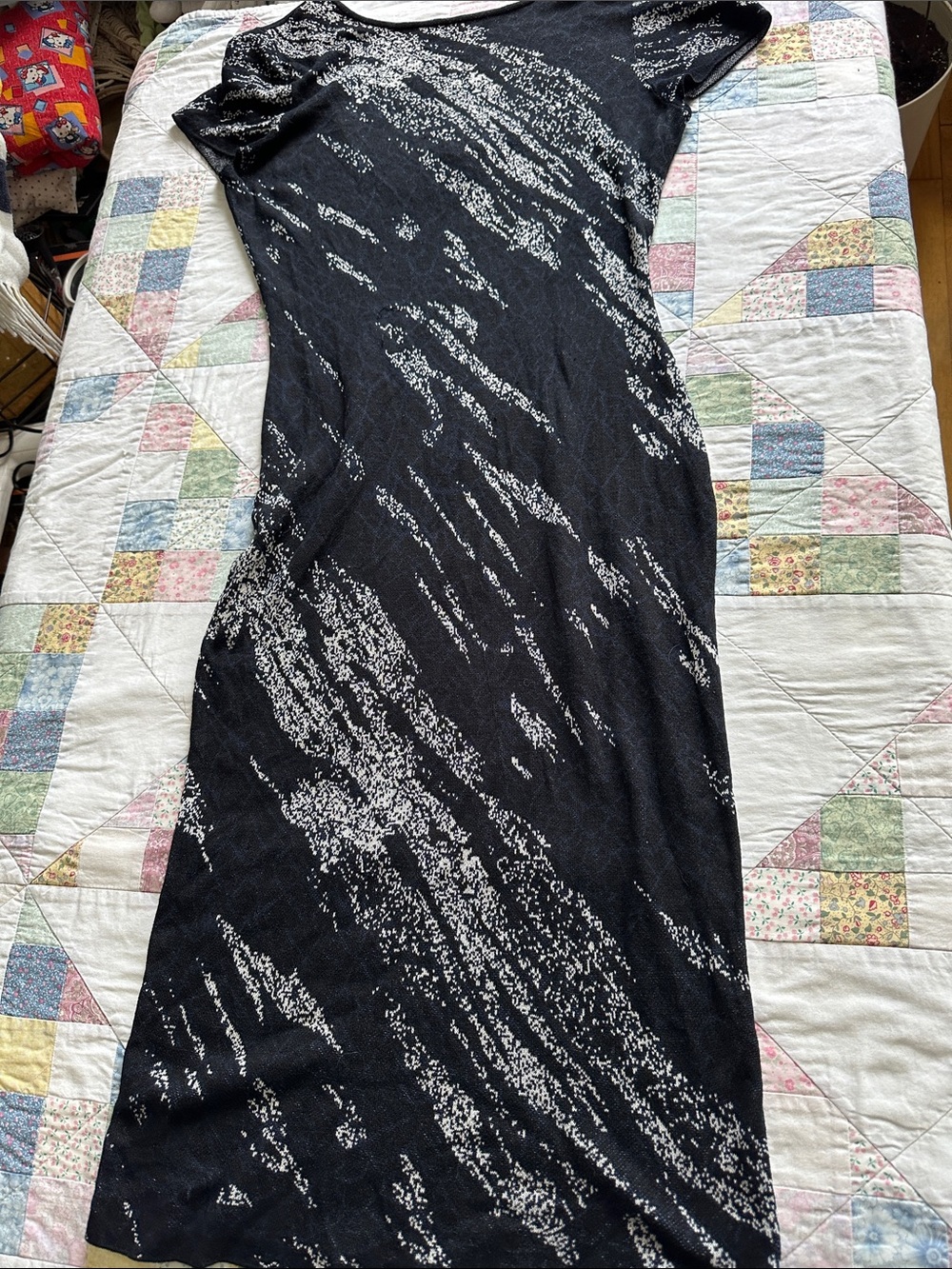 W—Black Silk blend Midi Dress with White Abstract Pattern and open back.